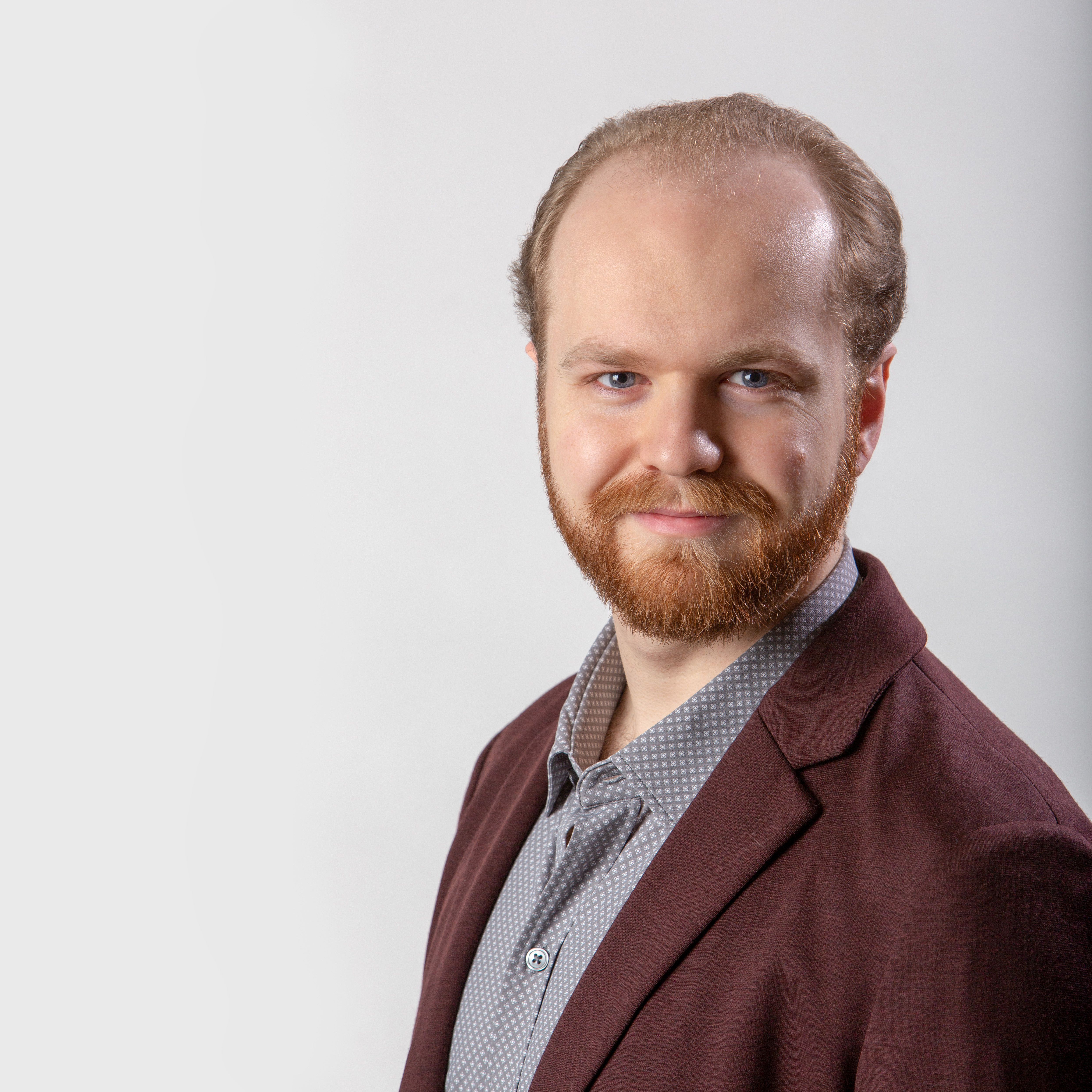professional headshot of George Felton